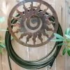 Rustic Sun Wall-Mount Garden Hose Hanger 2 Rustic Sun Wall-Mount Garden Hose Hanger -Garden Care Shop 8611025 9611 tif